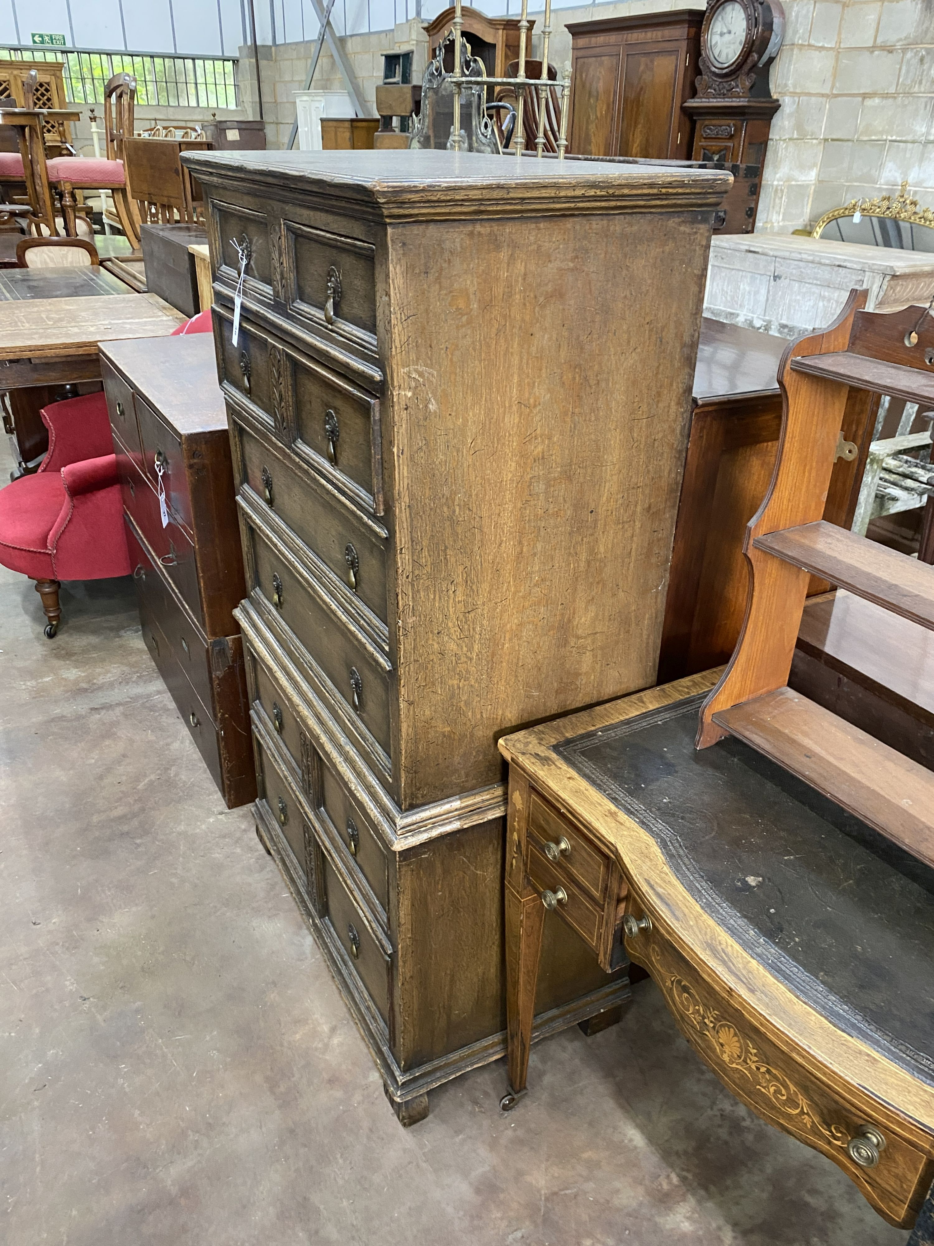 An early 20th century oak chest on chest, width 79cm, depth 45cm, height 140cm